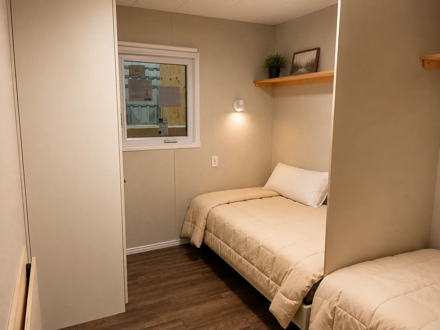 Chambre de dortoir mobile avec deux lits simples pour chantier